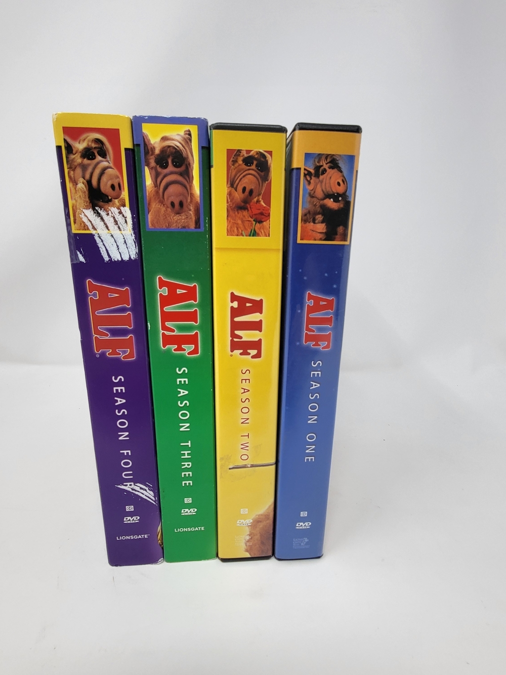 ALF DVD Box Set Seasons 1-4 - Colorful Spines (Blue, Yellow, Green, Purple)